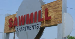 Sawmill Apartment Sign