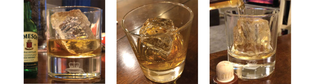 whiskey on crystal clear ice cubes 